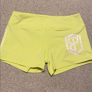 Bright Yellow Born Primitive workout shorts